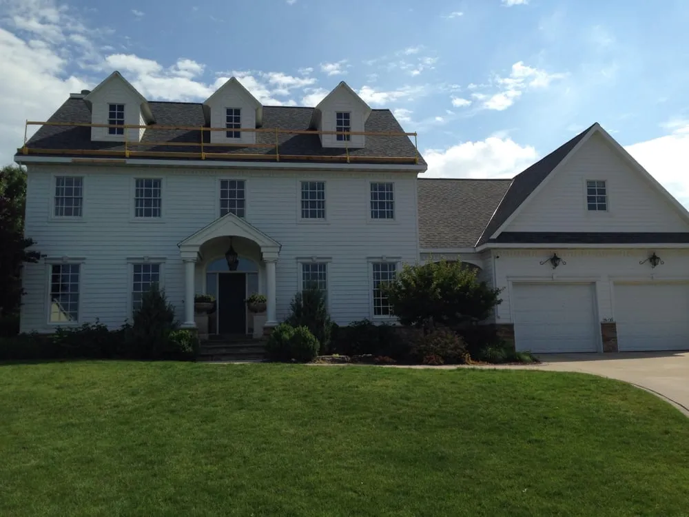 Slide of Al's Roofing Service