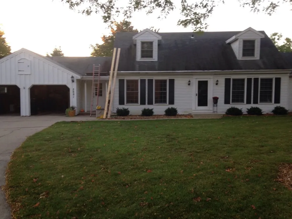 Slide of Al's Roofing Service