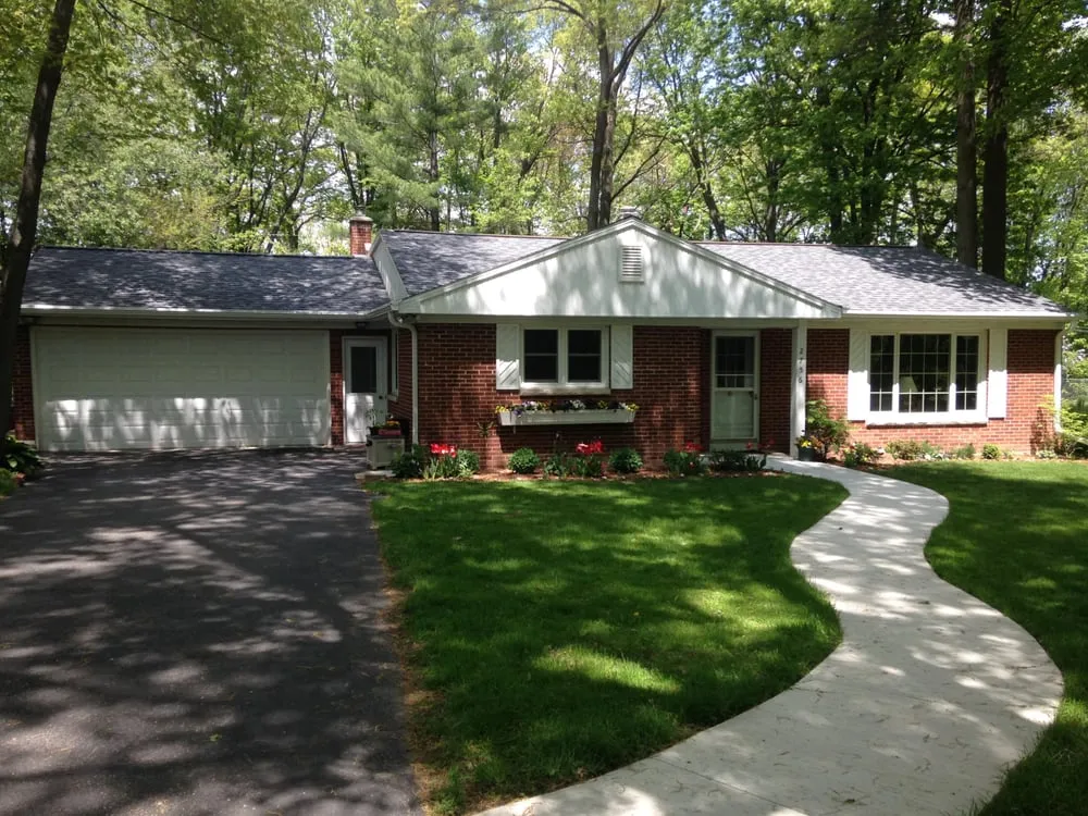 Slide of Al's Roofing Service