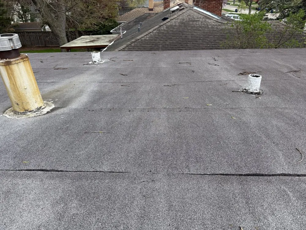 Local roof leak repair for fast service in Newton Centre, MA by Alutec Masonry