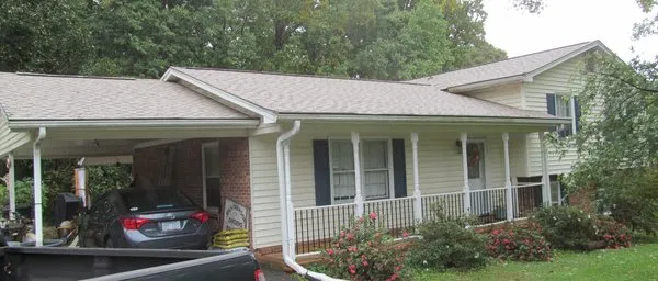 Alvarez Roofing And Gutters Logo