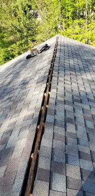Alvaro Avila's Roofing & Siding Logo