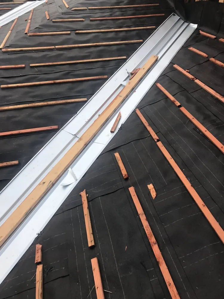 Slide of Alvaro's Roofing