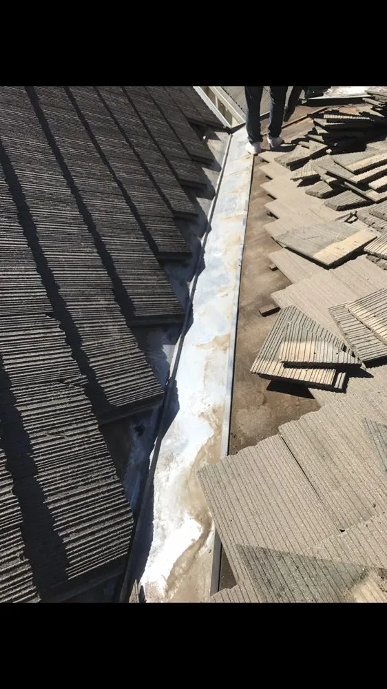 Slide of Alvaro's Roofing