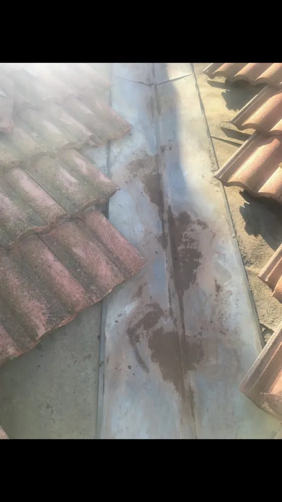 Slide of Alvaro's Roofing