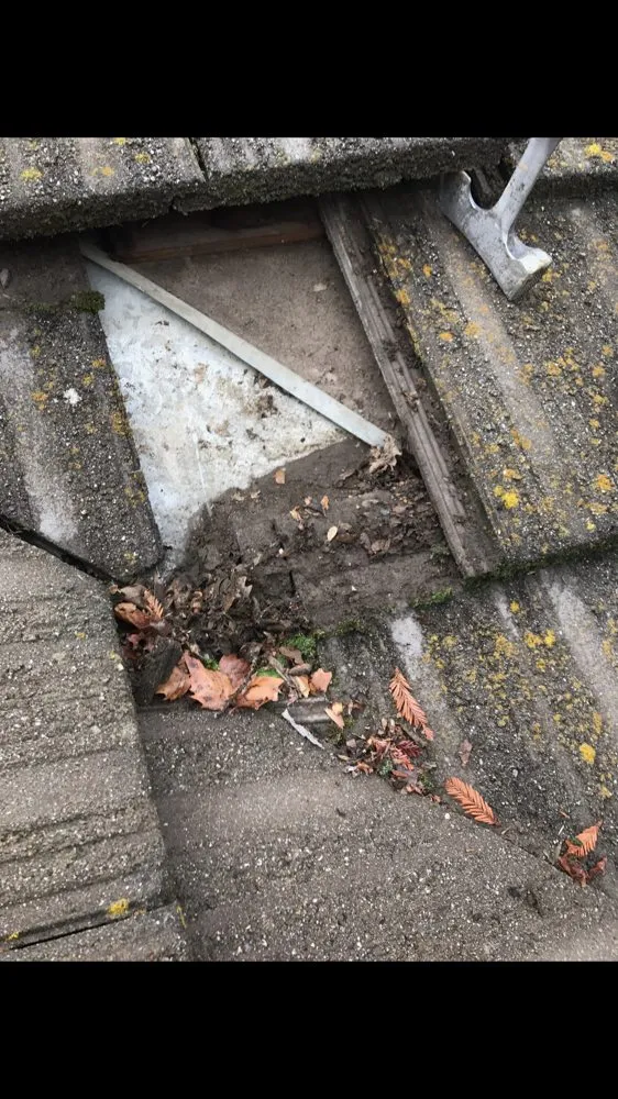 Slide of Alvaro's Roofing