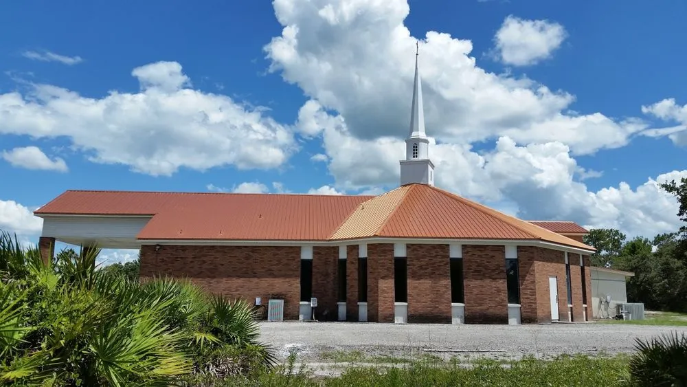Slide of AM Best Roofing