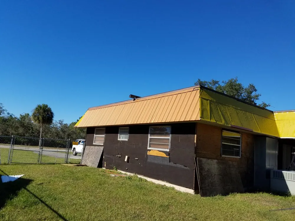 Slide of AM Best Roofing