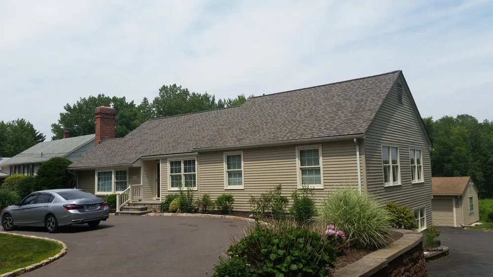 Slide of AM PM Roofing