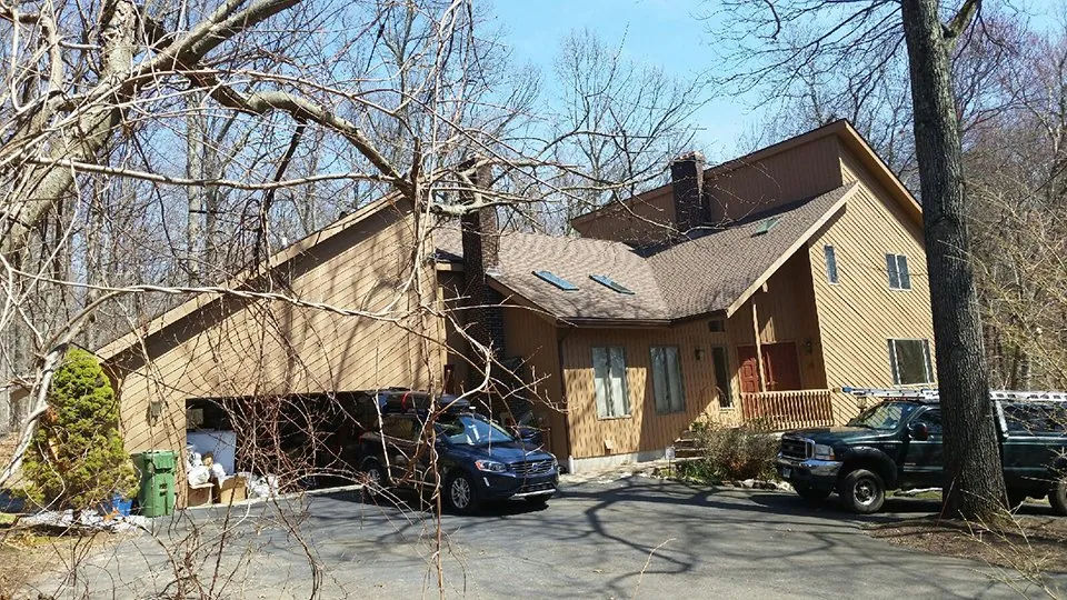 Slide of AM PM Roofing