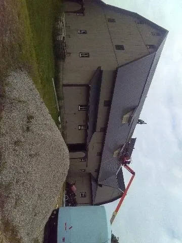 Slide of AM Pro Commercial Roofing