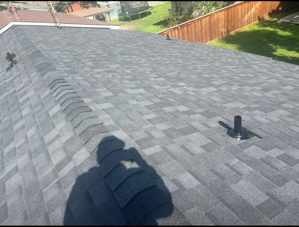 Slide of AM Quality Roofing and Construction