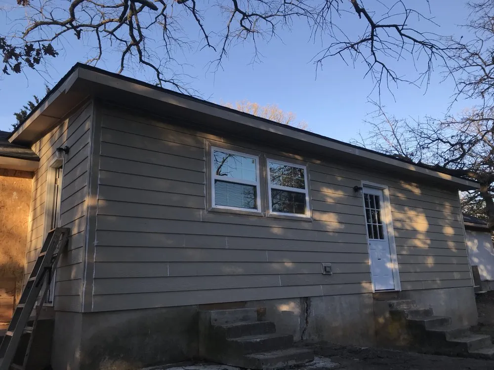 Slide of AM Roofing & Construction