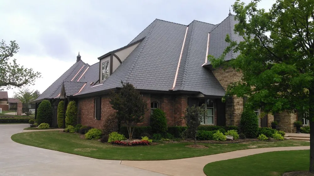 Slide of AM Roofing & Construction