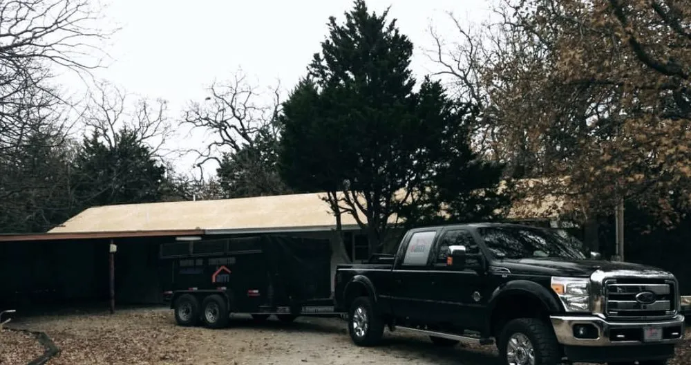 Slide of AM Roofing & Construction