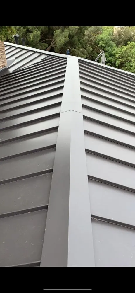 Slide of A&M Roofing and Gutters