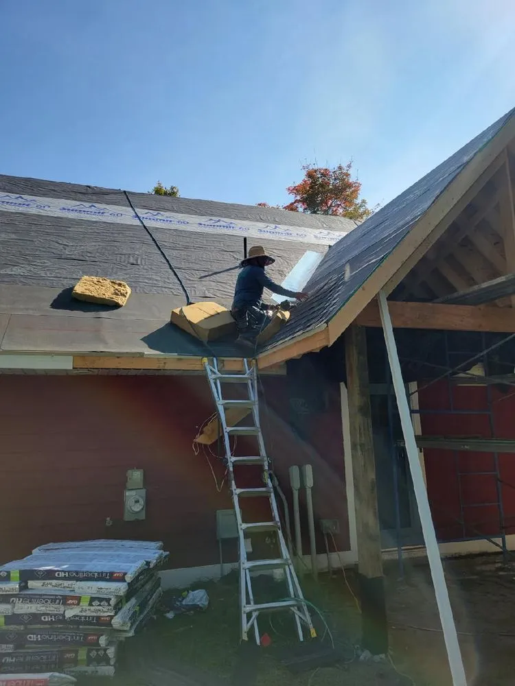 Slide of A&M Roofing