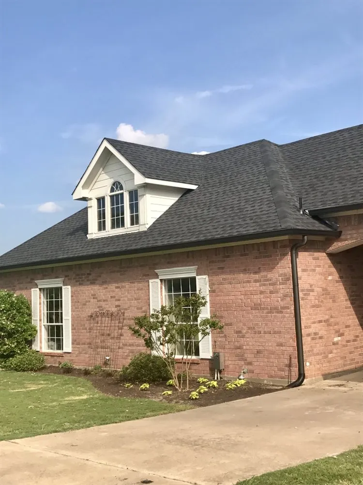 Slide of AM Roofing Company