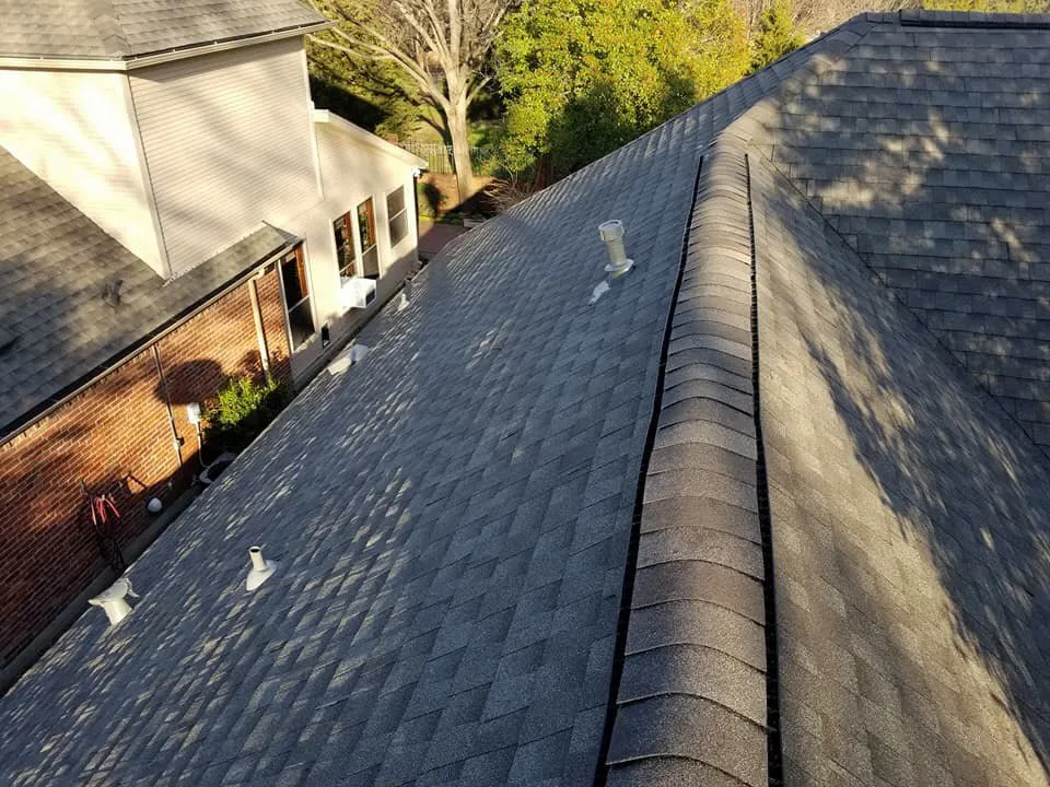 Slide of AM Roofing Company