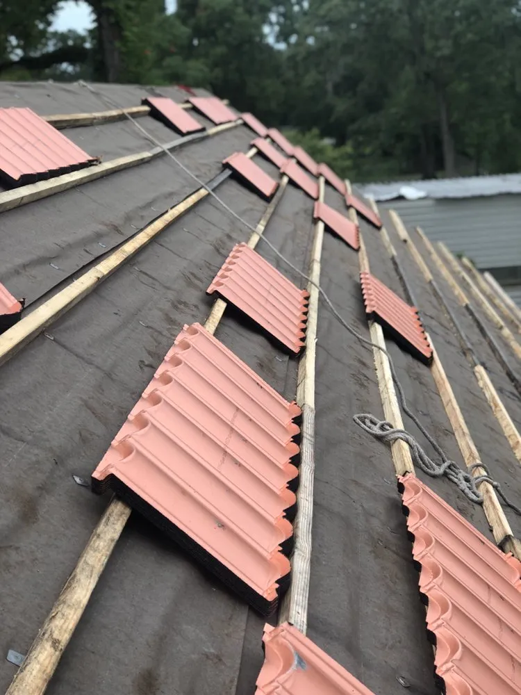 Slide of A&M Roofing