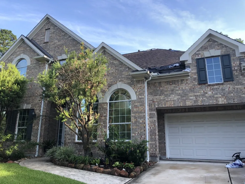 Slide of A&M Roofing