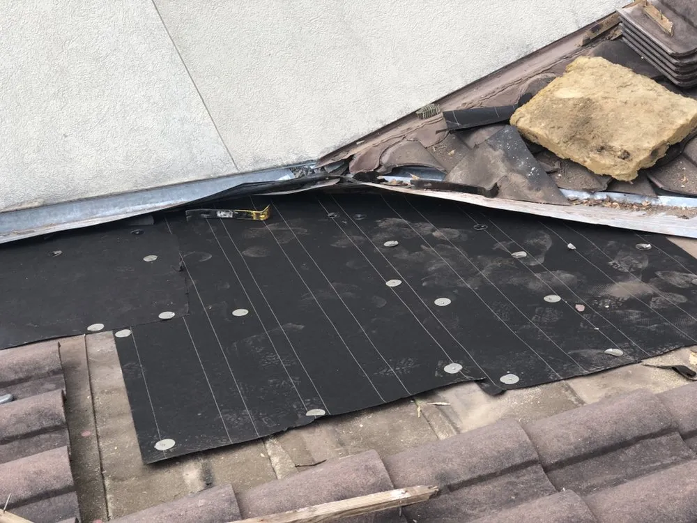 Slide of A&M Roofing