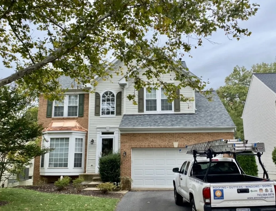 Slide of A&M Roofing