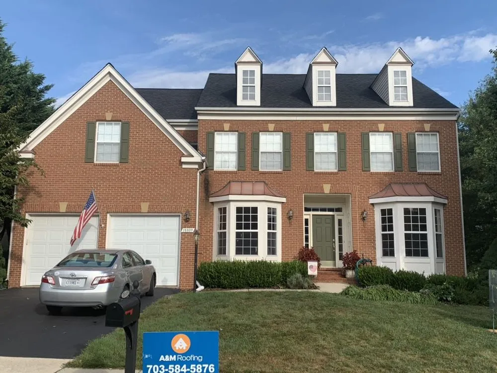 Slide of A&M Roofing