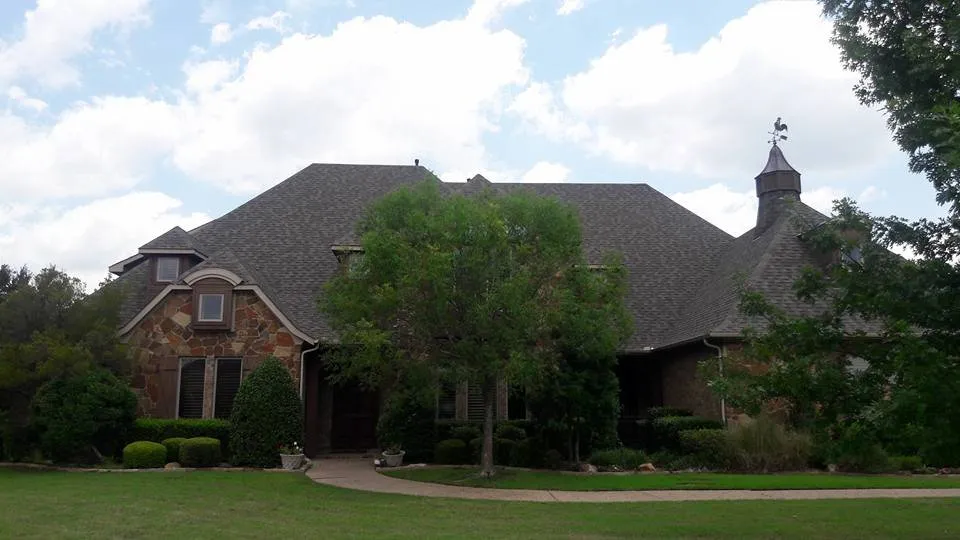 Slide of Ambassador Roofing