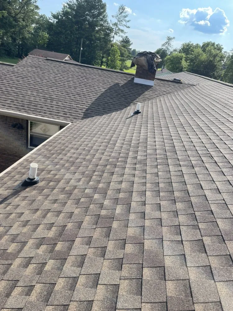 Local roof repair for fast service in Sedalia, KY by Ambient Roofing Co
