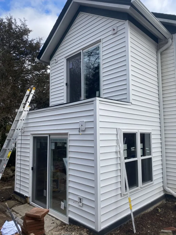 Slide of Ambition Exteriors