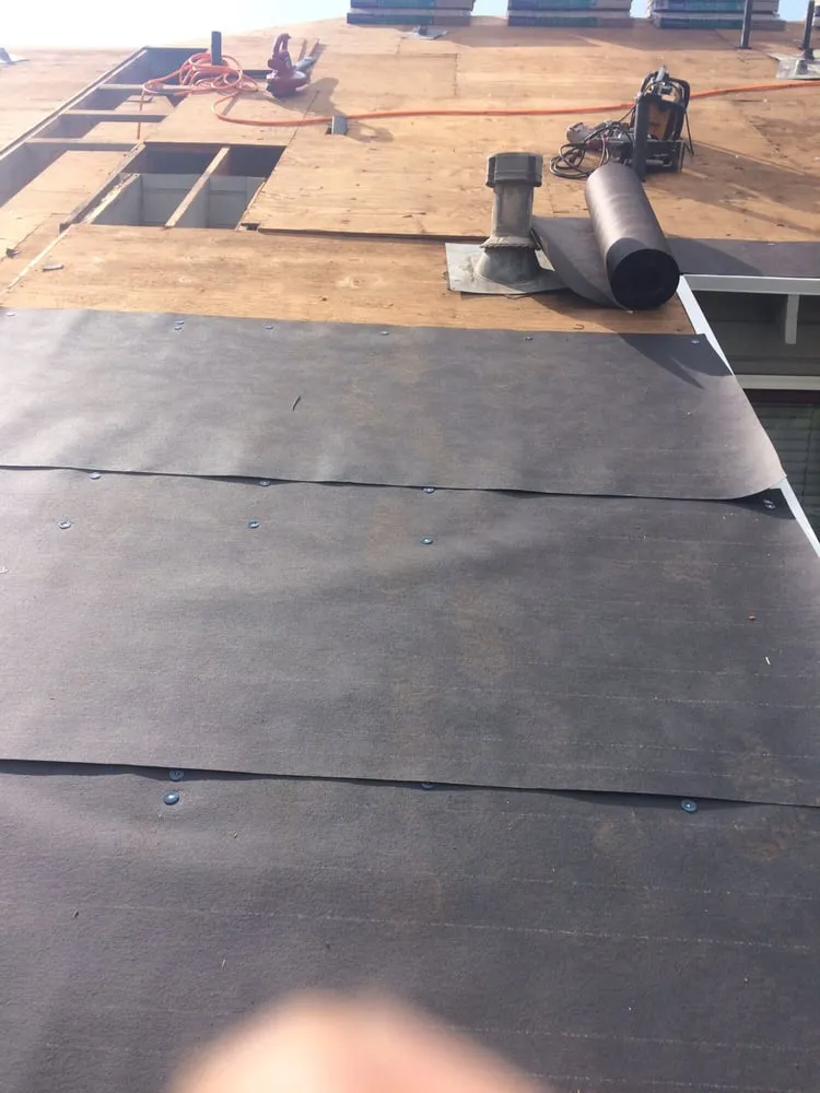 Slide of Ambriz Roofing