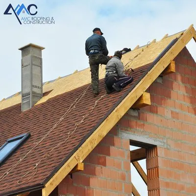 AMC Roofing & Construction Logo