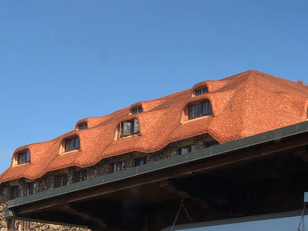 Slide of AMC Roofing