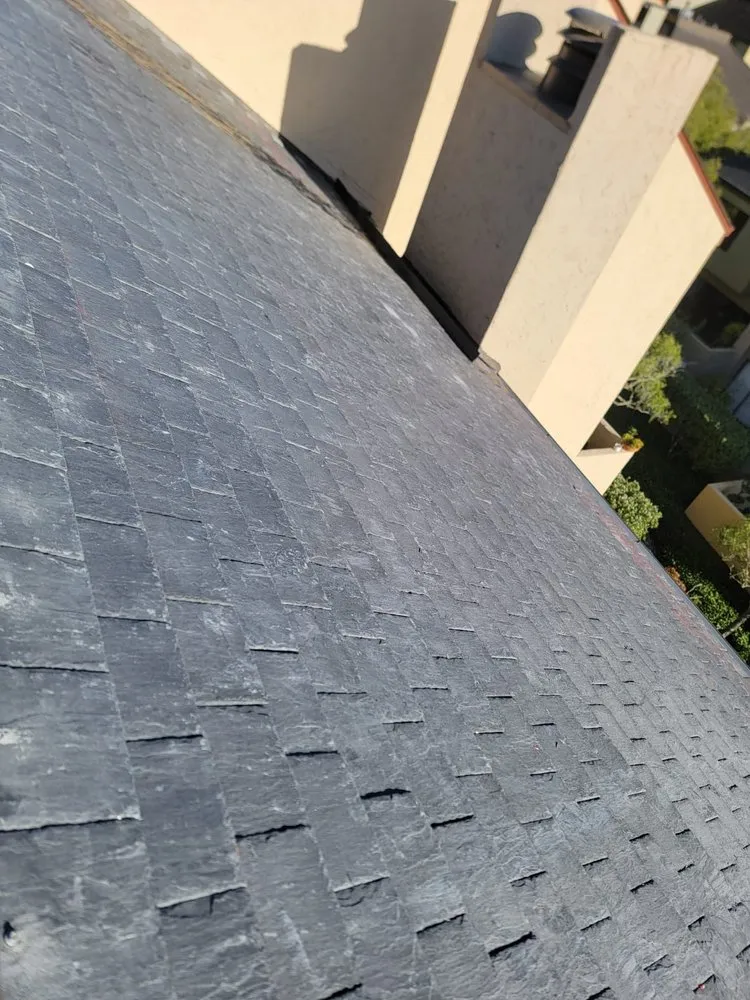 Slide of AmCal Roofing