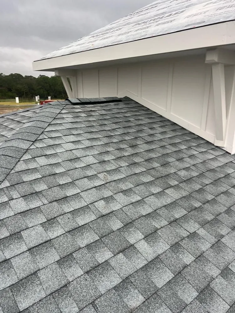 Slide of Amen Roofing Group