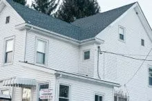 Expert storm damage roof repair experts serving Northhampton, PA - American Construction & Roofing