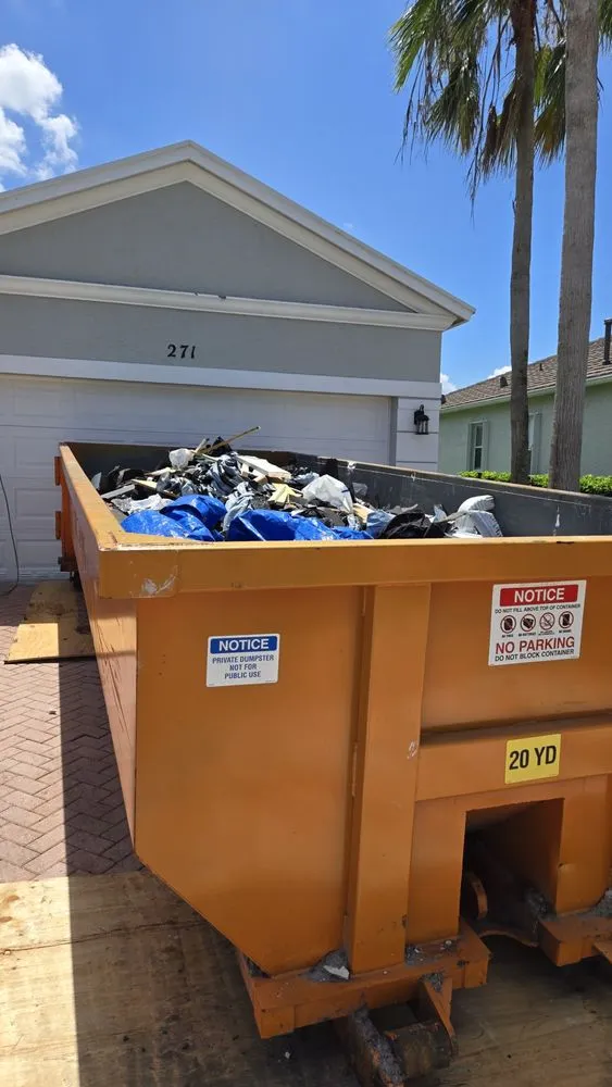 Trusted storm damage roof repair in Port St. Lucie, FL - American Dumpsters and Roll off Services