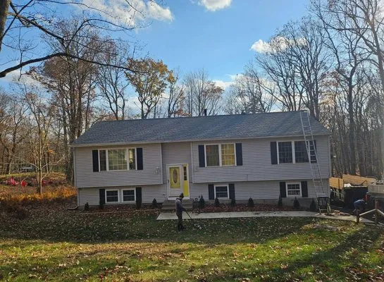 American Eagle Roofing And Construction Logo