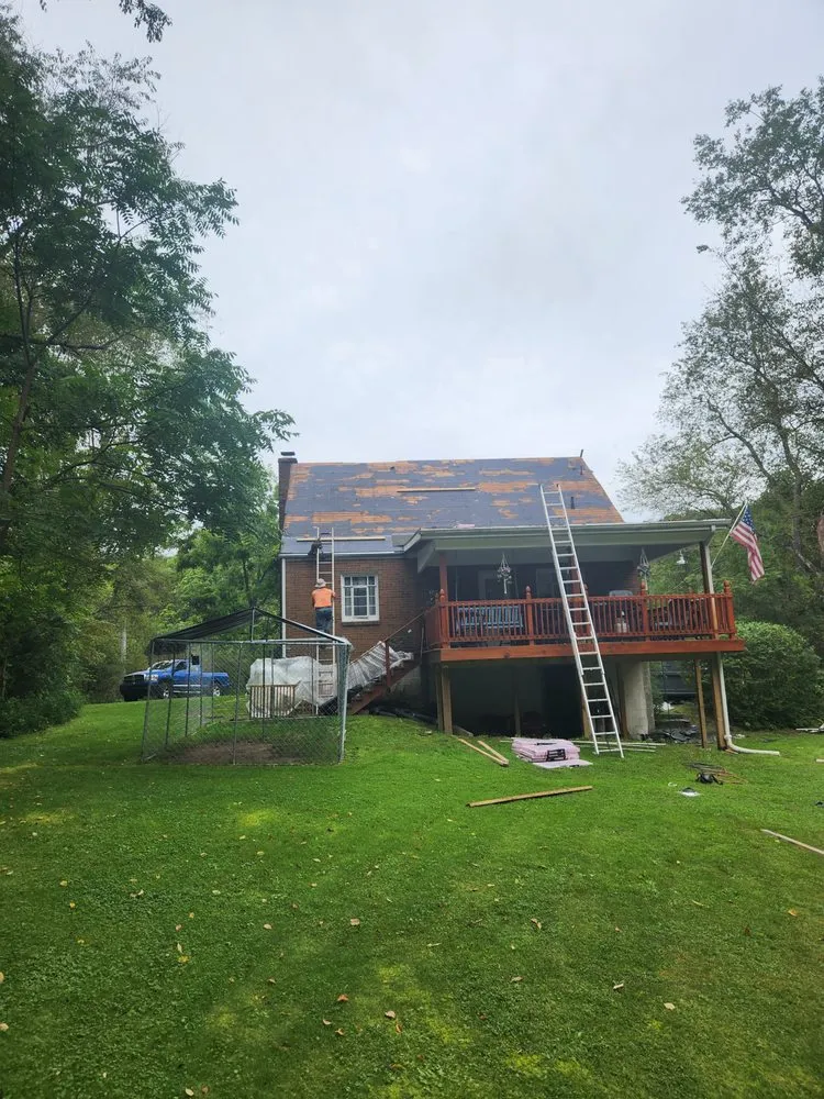 Slide of American Made Roofing and Construction