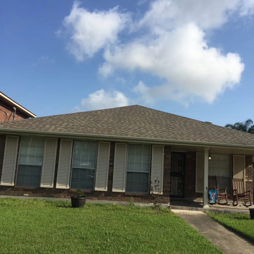 Slide of American Men Roofing