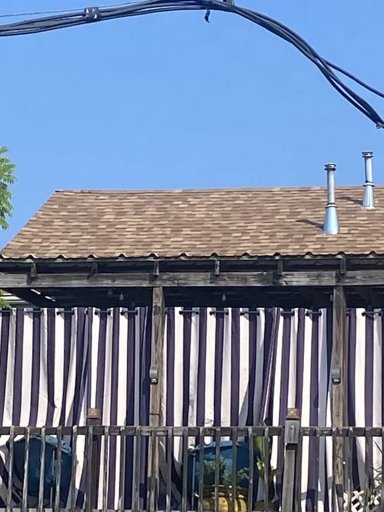 Slide of American Men Roofing