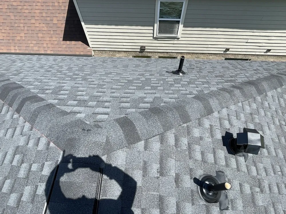 Slide of American Quality Roofers