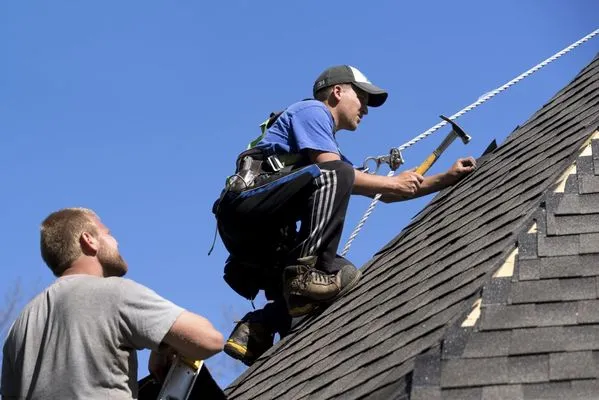 American Quality Roofers Logo
