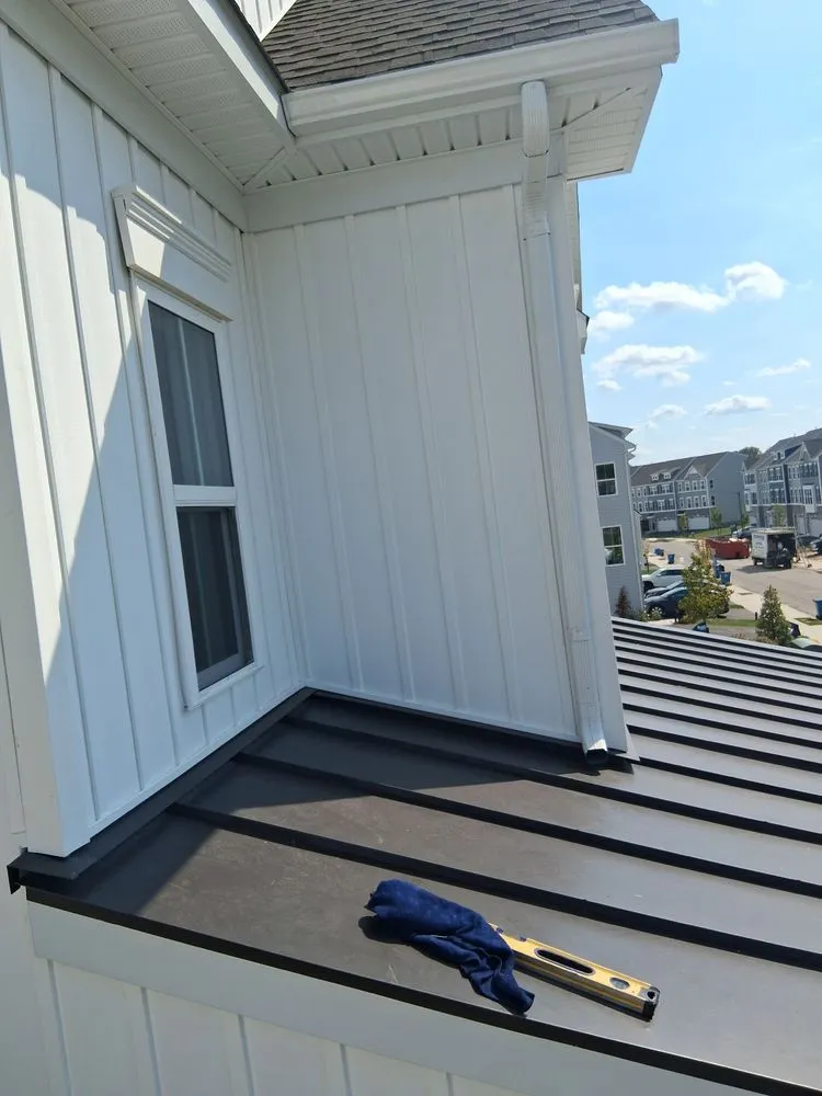 Slide of American Quality Roofing and Siding