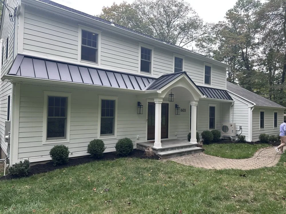 Slide of American Quality Roofing and Siding