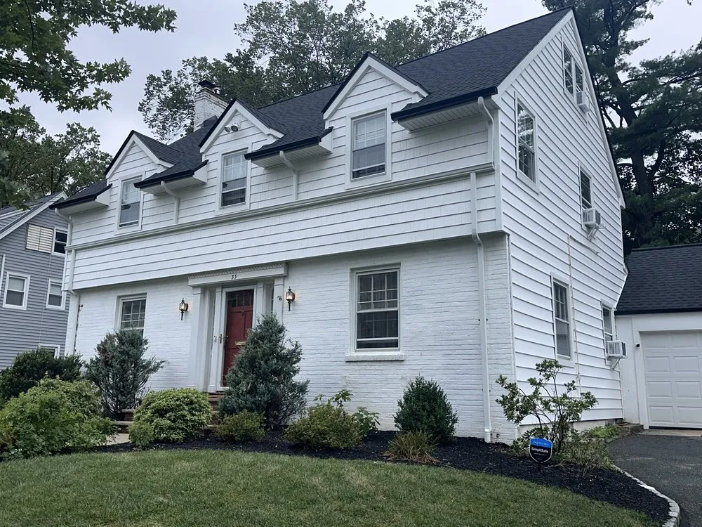 Slide of American Quality Roofing and Siding