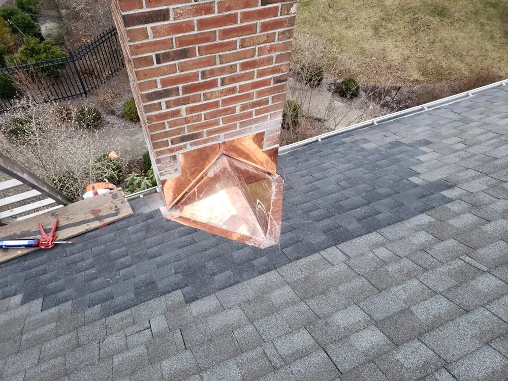 Slide of American Quality Roofing and Siding