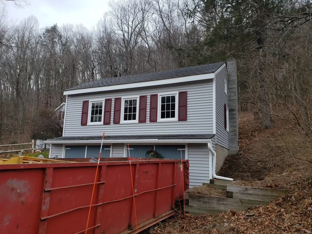 Slide of American Quality Roofing and Siding