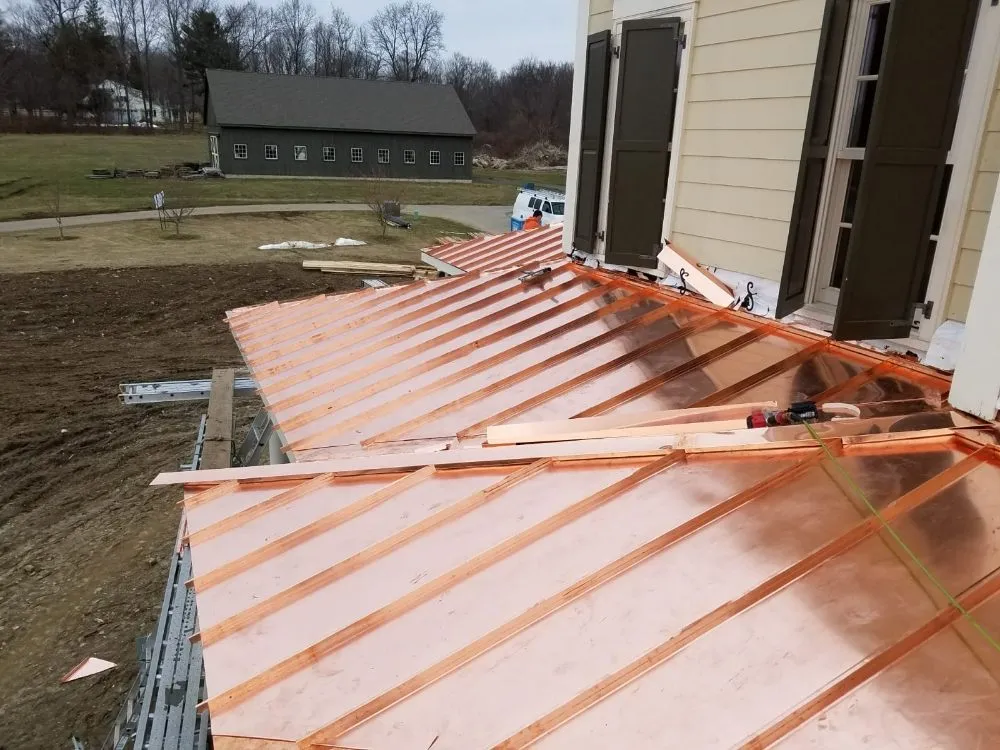 Slide of American Quality Roofing and Siding